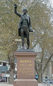 Statue of Edmund Burke atop a plinth at St Augustine's Parade, Bristol, UK