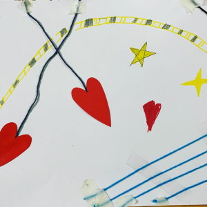 Drawing from an Art Therapy Session showing red hearts and yellow and gold stars
